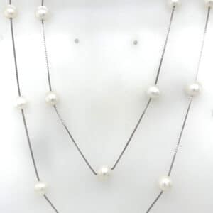 Silver and pearl long necklace